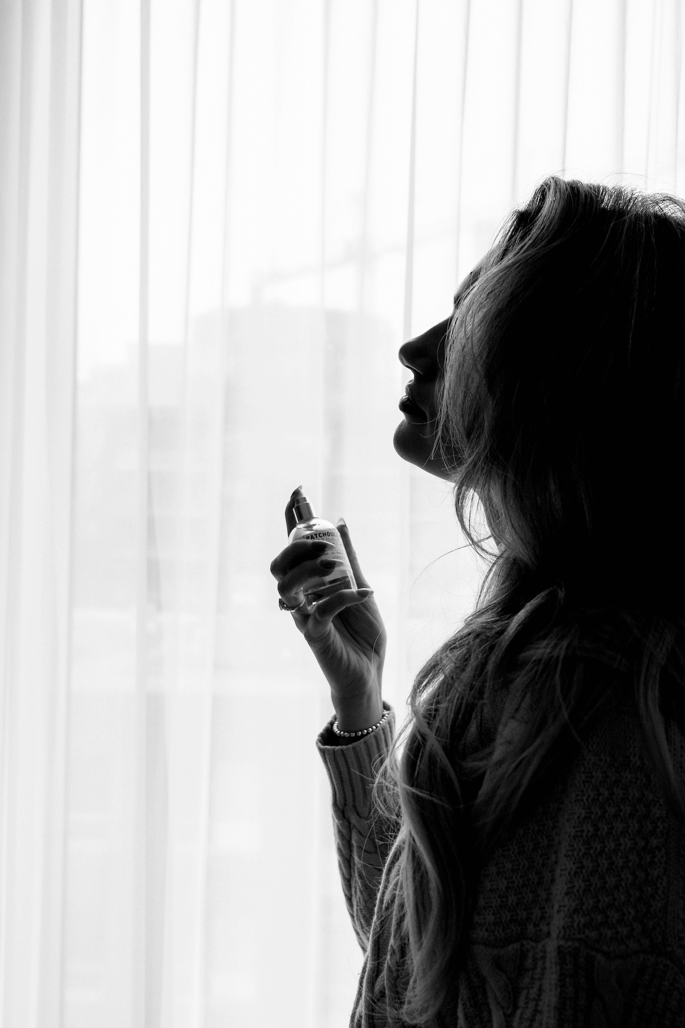 Woman enjoying a luxury fragrance